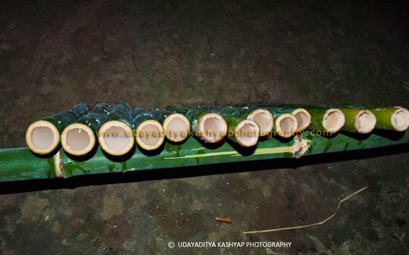 Bamboo tubes fill with rice and water